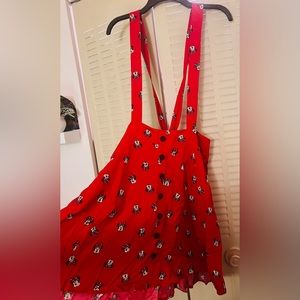Torrid x Disney suspender skirt with buttons. NWT. Straps tie in back. Sz 0/lg
